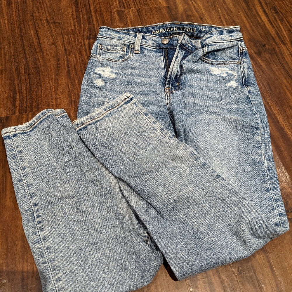 Acid wash distressed denim jeans